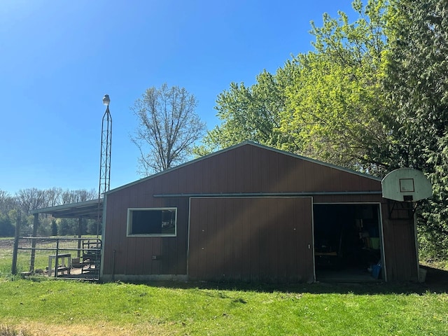 view of pole building with a yard