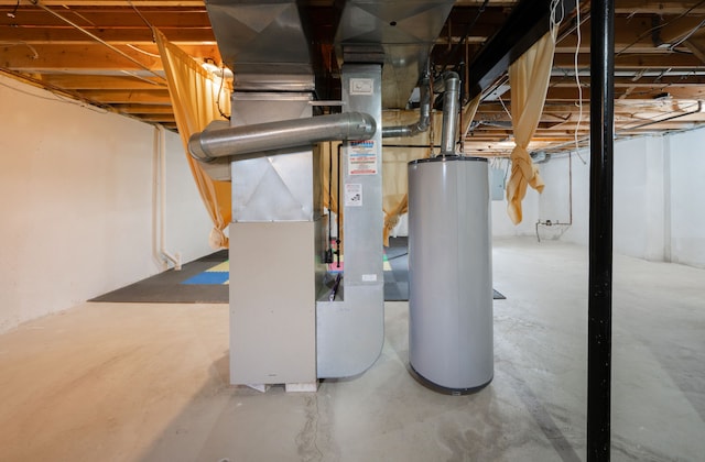 unfinished basement featuring heating unit and gas water heater