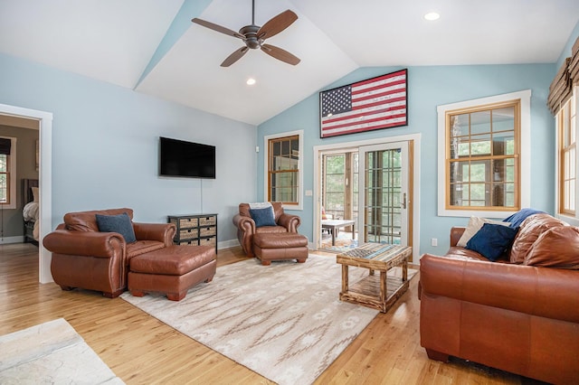 living area with light wood-style flooring, baseboards, recessed lighting, lofted ceiling, and ceiling fan