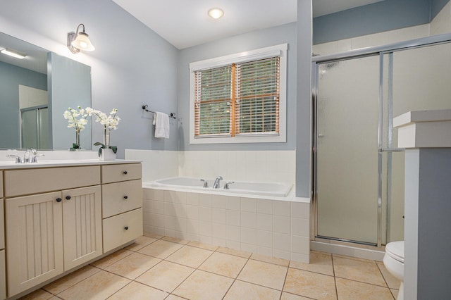 full bath with a bath, tile patterned flooring, vanity, and a stall shower