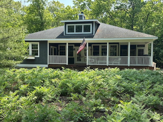 18743 Old Field Rd, New Buffalo, MI 49117 - view of front of house with a chimney and a porch