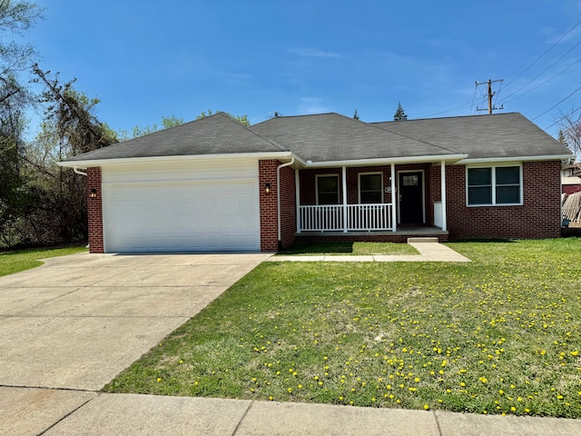 single story home featuring driveway, a porch, brick siding, a front yard, and a garage