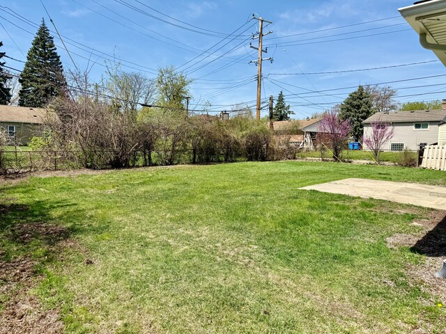 view of yard with fence and a patio area