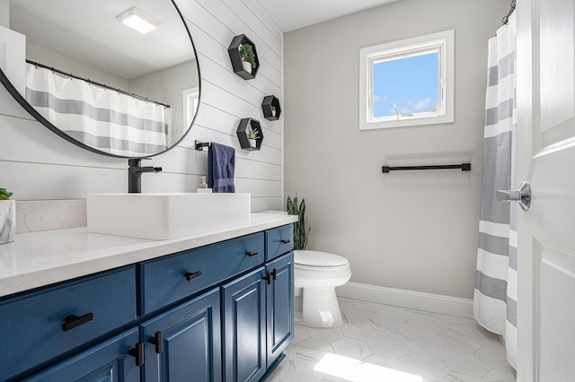 5591 Pioneer Ave, Saint Joseph, MI 49085 - full bathroom with toilet, vanity, and baseboards