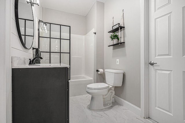 5591 Pioneer Ave, Saint Joseph, MI 49085 - full bathroom featuring  shower combination, toilet, baseboards, marble finish floor, and vanity