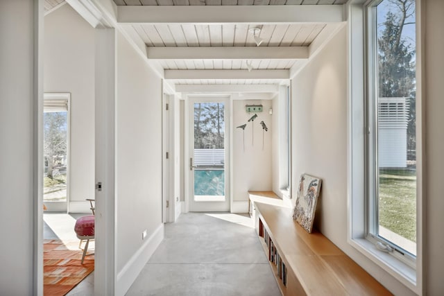 mudroom featuring baseboards, a healthy amount of sunlight, wooden ceiling, and beamed ceiling