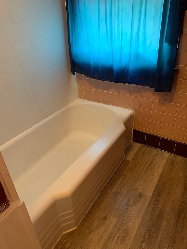 802 Dupont St, Flint, MI 48504 - full bath with a bath and wood finished floors