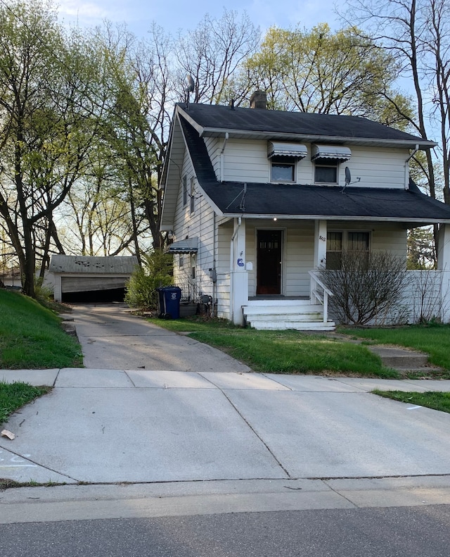 802 Dupont St, Flint, MI 48504 - view of front of home with a chimney