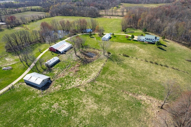 birds eye view of property featuring a rural view