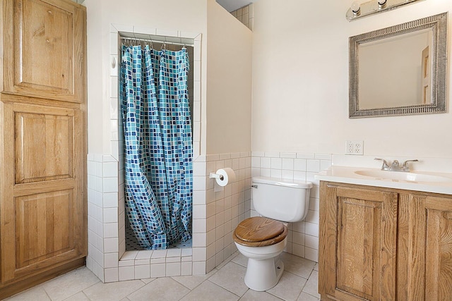 full bathroom featuring tile walls, tile patterned floors, a stall shower, and toilet