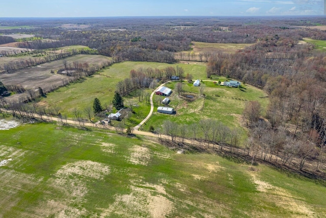 birds eye view of property featuring a rural view
