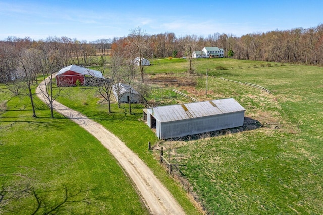 exterior space with a rural view and a forest view