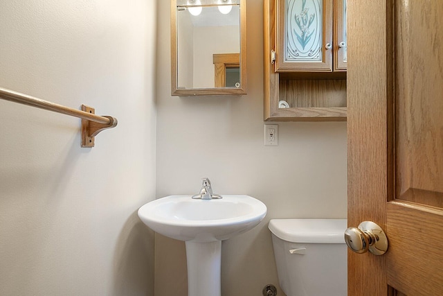 half bathroom with toilet