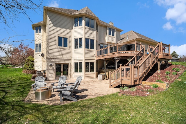 9037 Yorkshire Dr, Saline, MI 48176 - rear view of house with stairs, french doors, a patio, a lawn, and a deck