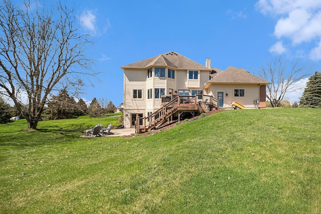 9037 Yorkshire Dr, Saline, MI 48176 - rear view of property featuring a lawn, stairway, and a deck