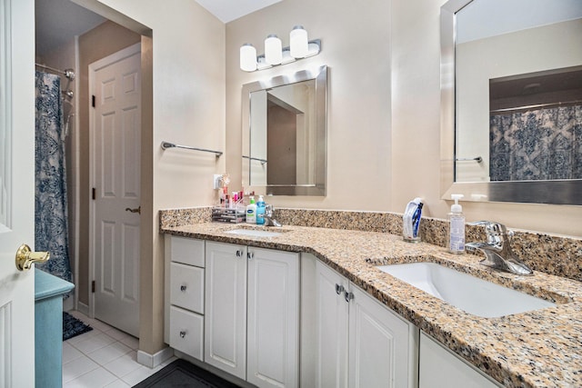 9037 Yorkshire Dr, Saline, MI 48176 - bathroom featuring double vanity, tile patterned flooring, and a sink