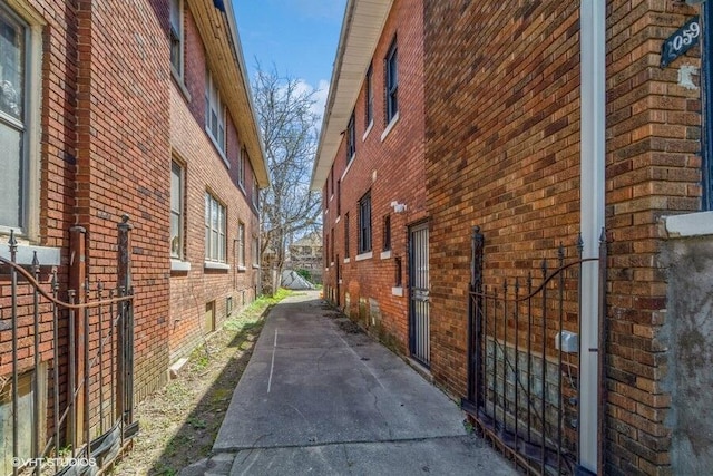 view of side of property with brick siding