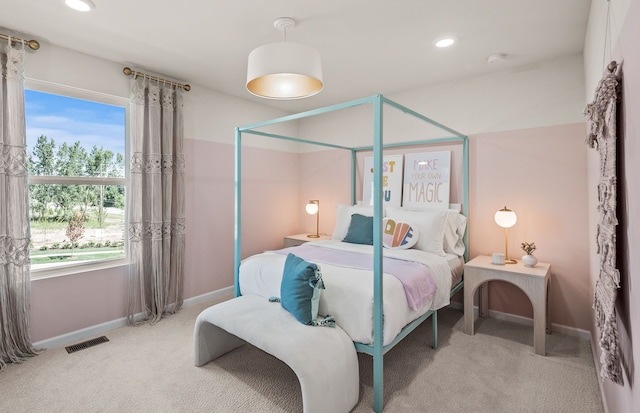 carpeted bedroom with baseboards, visible vents, and recessed lighting