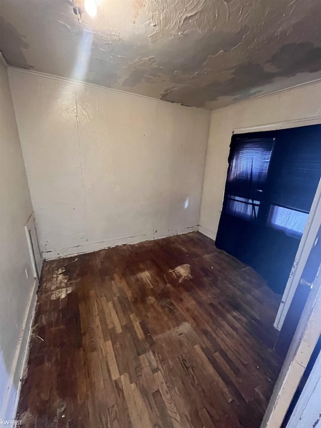 1048 Tremont Ave, Flint, MI 48505 - empty room with wood finished floors