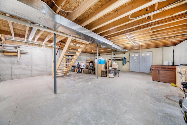 10500 Woodland Dr, Jerome, MI 49249 - unfinished basement featuring stairs