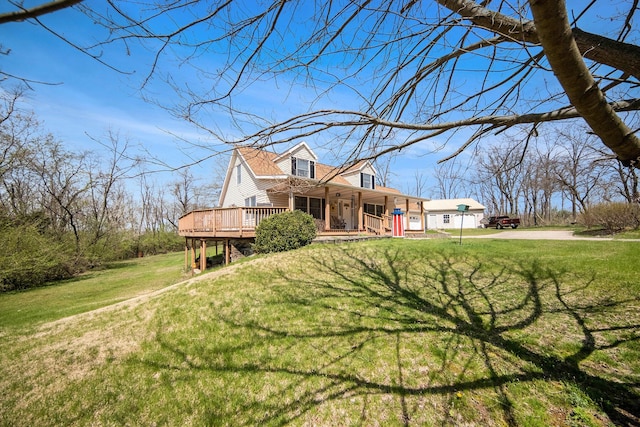 10500 Woodland Dr, Jerome, MI 49249 - traditional-style home featuring a porch and a front lawn