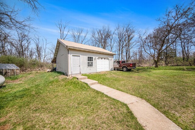10500 Woodland Dr, Jerome, MI 49249 - exterior space featuring a yard
