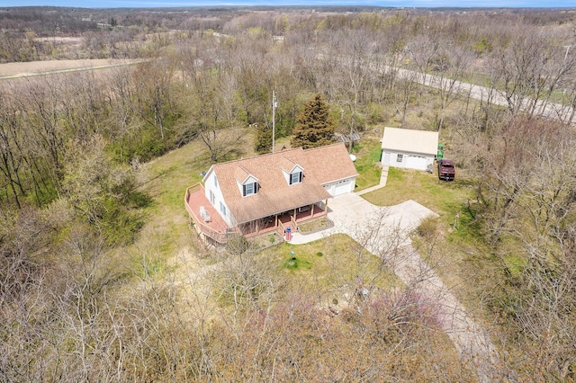 10500 Woodland Dr, Jerome, MI 49249 - drone / aerial view with a wooded view