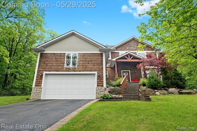 9327 Van Antwerp Rd, Brighton, MI 48116 - view of front of house featuring asphalt driveway, a front lawn, stone siding, and a garage