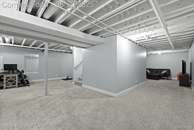 9327 Van Antwerp Rd, Brighton, MI 48116 - finished basement with carpet, baseboards, and stairway