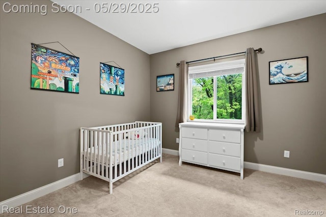 9327 Van Antwerp Rd, Brighton, MI 48116 - bedroom featuring carpet flooring, a nursery area, and baseboards