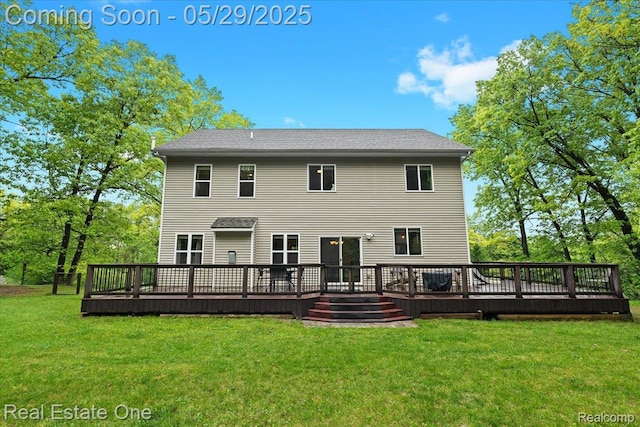 9327 Van Antwerp Rd, Brighton, MI 48116 - rear view of house with a yard and a wooden deck