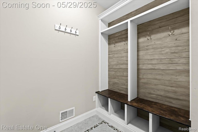 9327 Van Antwerp Rd, Brighton, MI 48116 - mudroom with baseboards and tile patterned floors