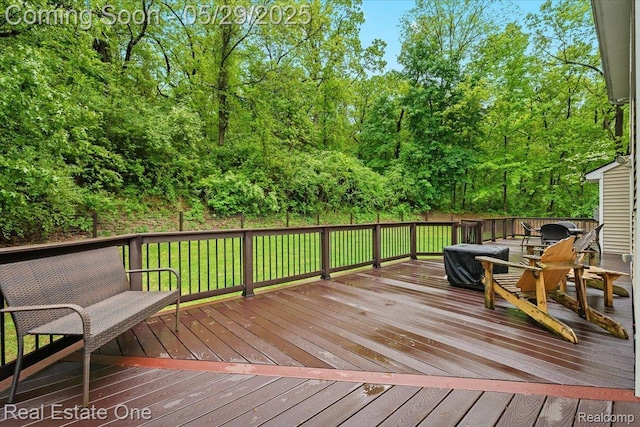 9327 Van Antwerp Rd, Brighton, MI 48116 - deck featuring view of scattered trees
