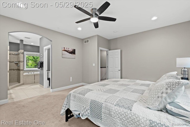 9327 Van Antwerp Rd, Brighton, MI 48116 - tiled bedroom with arched walkways, carpet floors, baseboards, recessed lighting, and ceiling fan