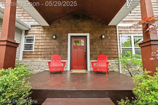 9327 Van Antwerp Rd, Brighton, MI 48116 - property entrance featuring stone siding