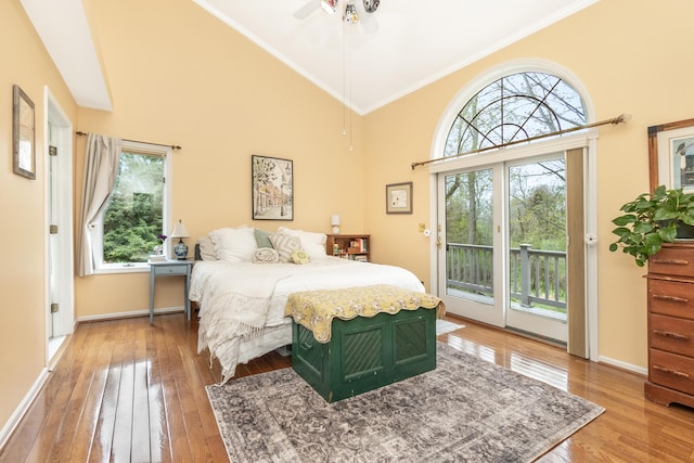 70 Chestnut Ct, Chelsea, MI 48118 - bedroom with access to outside, crown molding, multiple windows, and light wood finished floors