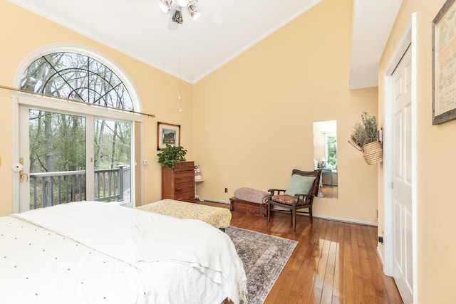 70 Chestnut Ct, Chelsea, MI 48118 - bedroom featuring hardwood / wood-style flooring, baseboards, ornamental molding, high vaulted ceiling, and access to outside