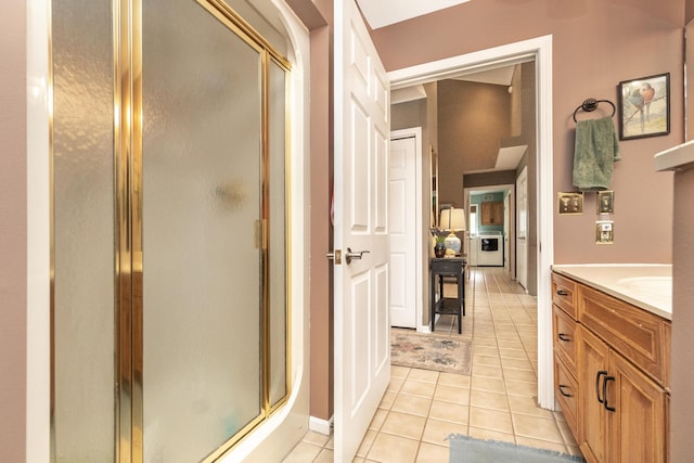 70 Chestnut Ct, Chelsea, MI 48118 - full bathroom featuring vanity, a shower stall, and tile patterned flooring