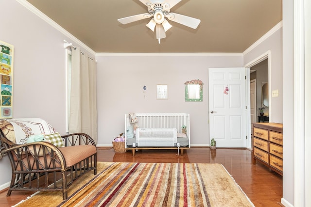 70 Chestnut Ct, Chelsea, MI 48118 - living area with baseboards, wood finished floors, ceiling fan, and crown molding