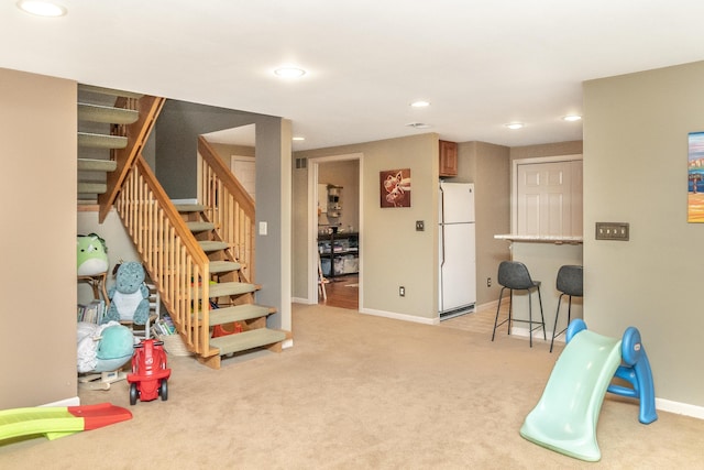 70 Chestnut Ct, Chelsea, MI 48118 - game room with light colored carpet, recessed lighting, and baseboards