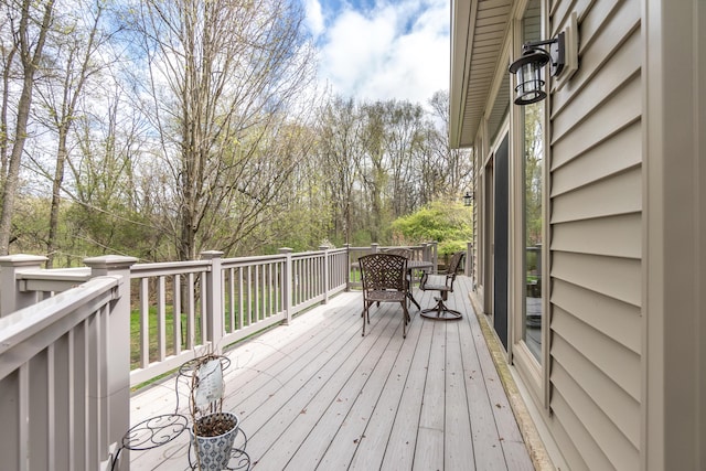 70 Chestnut Ct, Chelsea, MI 48118 - deck featuring outdoor dining space