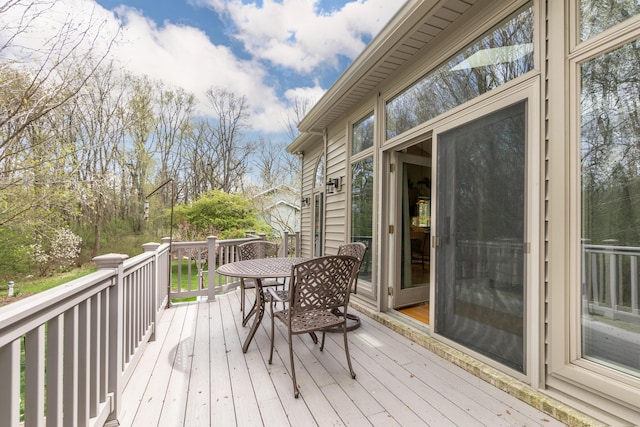 70 Chestnut Ct, Chelsea, MI 48118 - wooden terrace with outdoor dining space