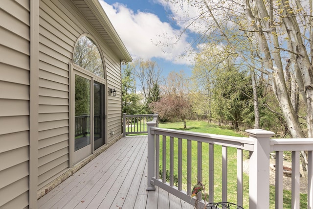 70 Chestnut Ct, Chelsea, MI 48118 - wooden terrace featuring a yard
