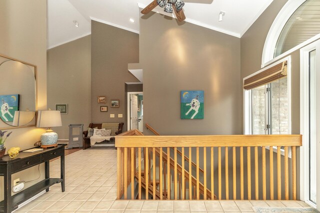 70 Chestnut Ct, Chelsea, MI 48118 - tiled entrance foyer with high vaulted ceiling, ceiling fan, and crown molding