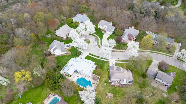 70 Chestnut Ct, Chelsea, MI 48118 - aerial view with a forest view and a residential view