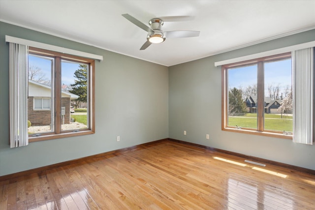 6030 Paw Paw Lake Rd, Coloma, MI 49038 - unfurnished room with light wood-style flooring, baseboards, and ceiling fan
