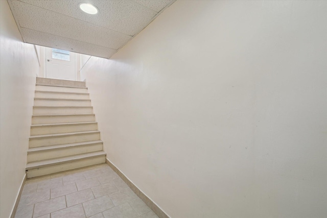 6030 Paw Paw Lake Rd, Coloma, MI 49038 - stairway featuring baseboards and tile patterned flooring