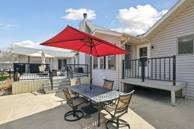 6030 Paw Paw Lake Rd, Coloma, MI 49038 - view of patio / terrace featuring outdoor dining area and a wooden deck