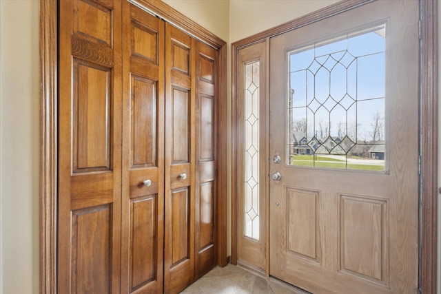 6030 Paw Paw Lake Rd, Coloma, MI 49038 - entryway with healthy amount of natural light and light tile patterned flooring