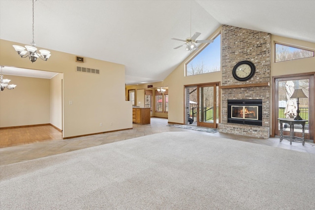 6030 Paw Paw Lake Rd, Coloma, MI 49038 - unfurnished living room featuring a chandelier, high vaulted ceiling, carpet, a brick fireplace, and a ceiling fan